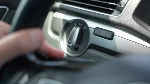 Hand Operating Turn Signal Lever Inside a Car Stock-Footage 333411445
