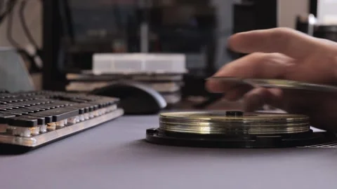 Hand organizing CD cases Stock Footage 312166826