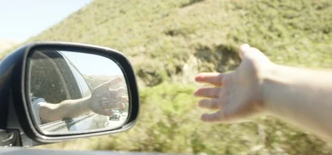 Hand Out Passenger Window of Car Stock Footage 85820022