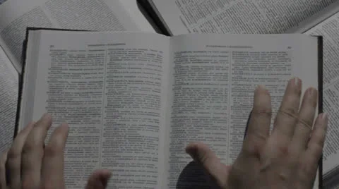 Hand over book while studying Stock Footage 25798005