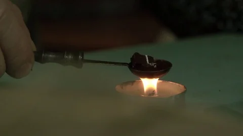 Hand over the candle heats up the material for printing Stock Footage 123005655