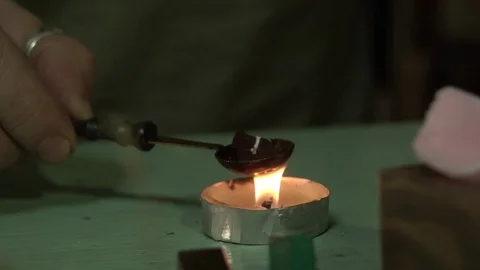 Hand over the candle heats up the material for printing Video stock 123005694