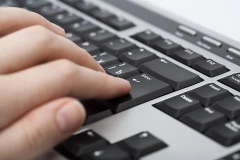 Hand over keyboard Stock Photos