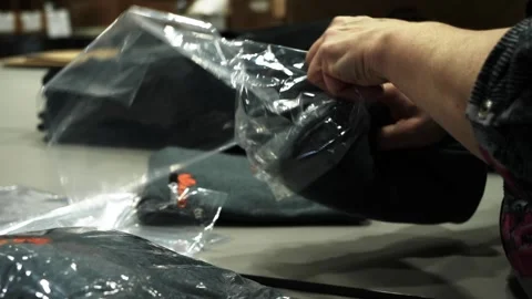 Hand Packaging Shirt Stock Footage 273499209