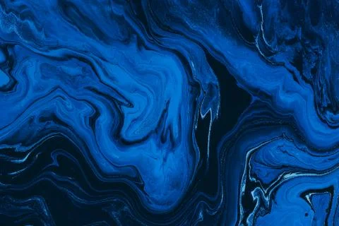 Hand painted background with mixed liquid blue paints. Abstract fluid acrylic Stock Photos