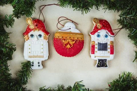Hand painted Christmas gingerbread nutcracker on a beautiful beige background Stock Photos