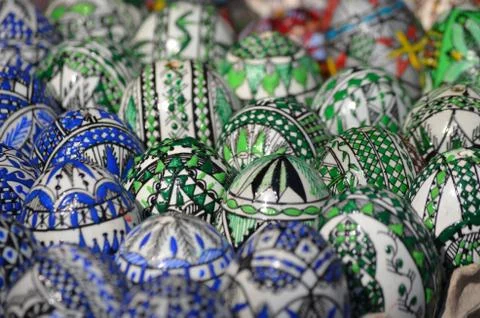 Hand painted Easter eggs, with blue and green paint Stock Photos