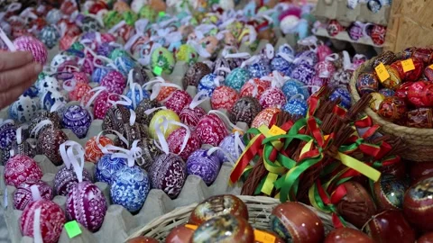 Hand painted Easter eggs on busy market stall Stock Footage 331812153