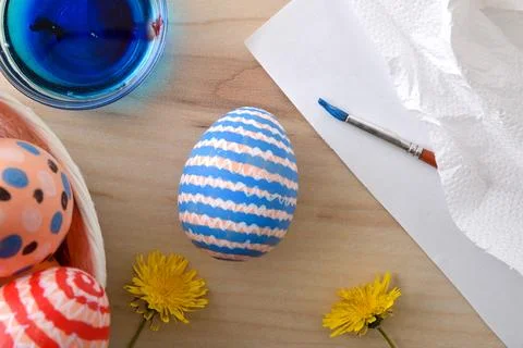 Hand-Painted Easter Eggs with Dye and Flowers Stock Photos