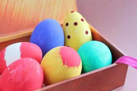 Hand painted easter eggs in gift box Stock Photos