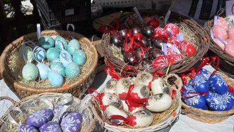 Hand-painted traditional Hungarian Easter eggs in wicker baskets. Stock Footage 332723434
