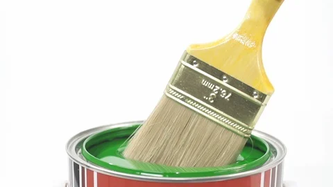 Hand of painter dipping a brush into a bucket with green paint , slow motion 스톡 동영상 107827288