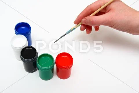 Hand painting and many paint Stock Photos
