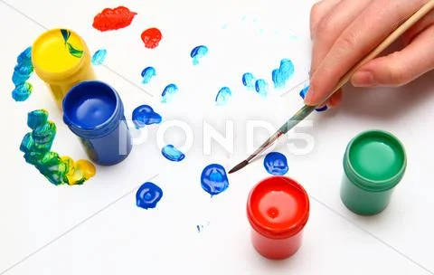 Hand painting and many paint Stock Photos