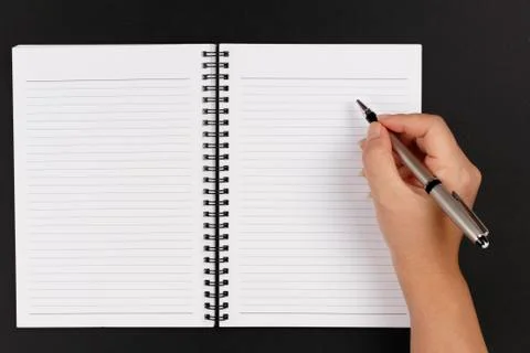 Hand, pen and notebook Stock Photos