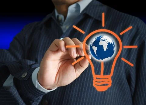 Hand with a pen drawing light bulb and globe Illustrazione stock