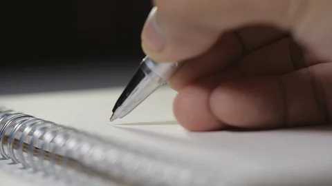 Hand pen writing in a notebook - 4K Stock-Footage 115632051