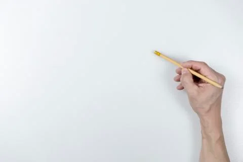 Hand with pencil eraser something isolated on white background with shadows Stock Photos