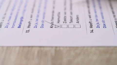 Hand with a pencil ticks checkbox marks filling up to do list. 스톡 동영상 169705825