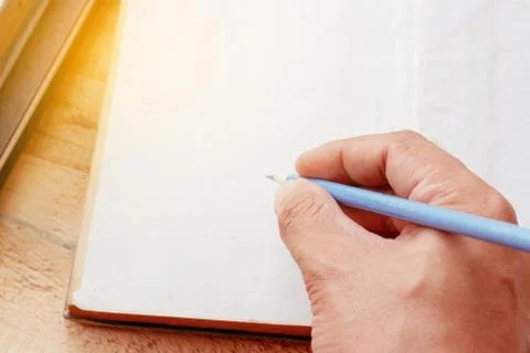 Hand with pencil writing Stock Photos