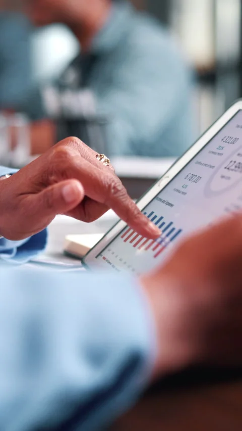 Hand, person or tablet screen with graphs in meeting for ad results, campaign Stock Footage 338424569