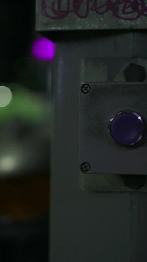 Hand of a person is pressing the traffic light button during night time. Stock Footage 329469267