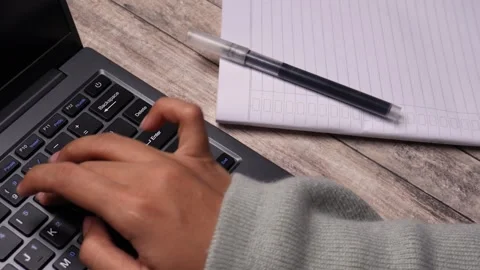 Hand person study or working with laptop and book note Stock Footage 274243346