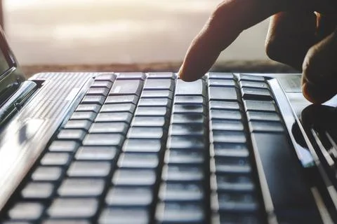 Hand person working and using on a laptop computer for a freelance working .. Stock Photos