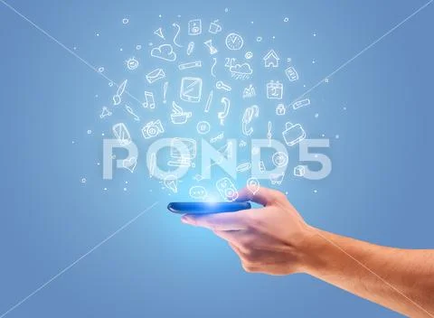 Hand with phone and drawn office icons Stock Photos
