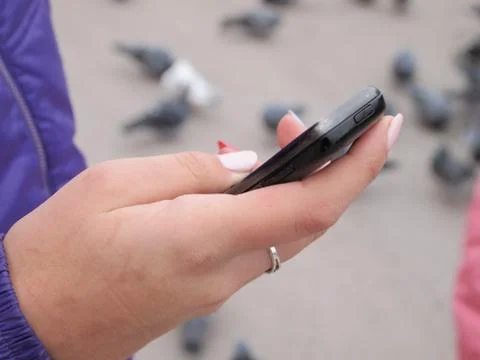 Hand with phone Stock Photos