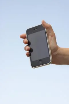 Hand with phone Stock Photos