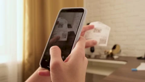 Hand with phone scans QR Code Stock-Footage 143623059