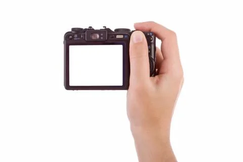 Hand photographing with a digital camera isolated on white. Stock Photos