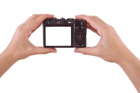 Hand photographing with a digital camera isolated on white. Stock Photos