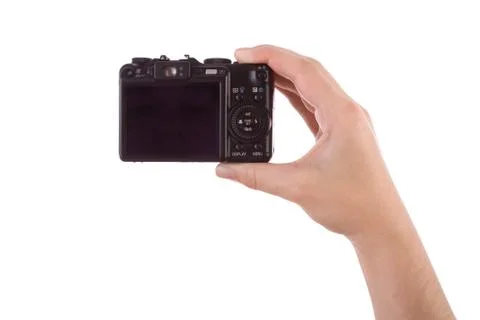 Hand photographing with a digital camera isolated on white Stock Photos