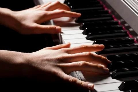 Hand of a pianist Stock Photos