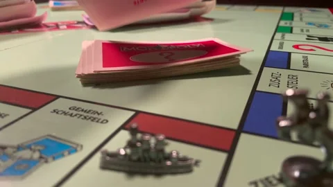 Hand Pick Card On Deck While Playing Monopoly Board Game At Home. - close Stock-Footage 149426770