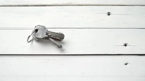 Hand pick up keys close up Stock Footage 67551841