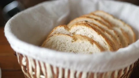 Hand pick a slice of a brow Bread 스톡 동영상 237639060