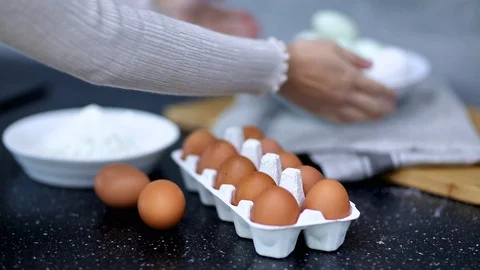 Hand picking egg from carton Stock Footage 95967725