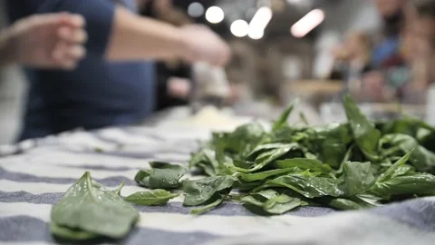 Hand picking fresh basil leaves in the kitchen Stock Footage 171462811