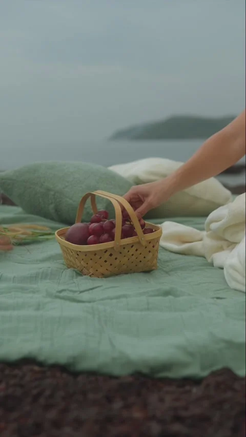Hand Picking Grape from Woven Fruit Basket Stock Footage 330910177