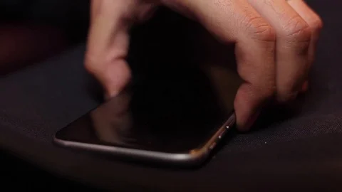 Hand picking up on mobile phone slow motion 스톡 동영상 76916152