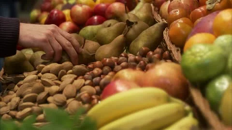 A hand picking a pear Stock Footage 11282109