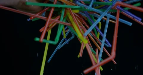 Hand Picking Up Plastic Colourful Straws In Anger. Plastic Pollution Stock Footage 111933050