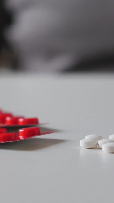 Hand Picking Up Round White Pills. Slider Shot. Vertical. Stock Footage 296895976
