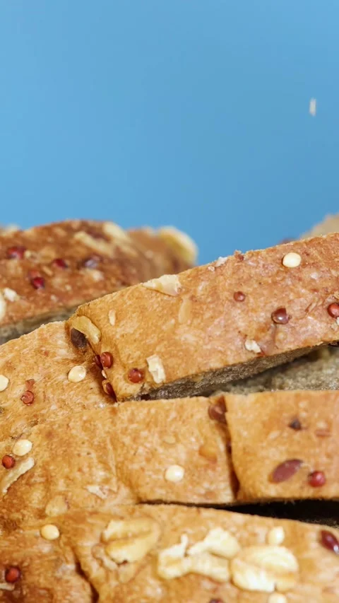 Hand Picking Slice from Whole Wheat Bread Loaf 스톡 동영상 312491468