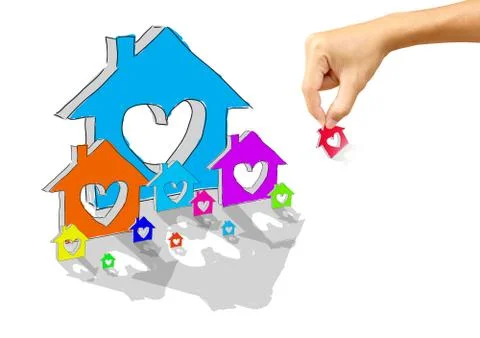 Hand picking up a small house, isolated on a white background . 스톡 일러스트