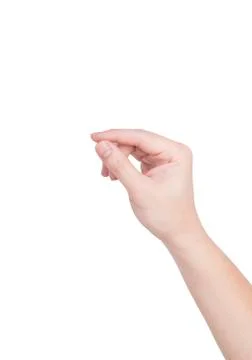 Hand picking up something Stock Photos