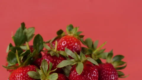Hand picking a strawberry Stock Footage 138786164